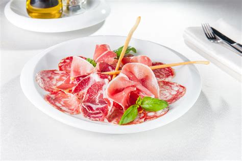 Assortment Of Delicatessen Cold Italian Meat Salami Ham And Bacon On