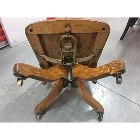 Wasn't mad men just the greatest? Antique Wood Rolling Office Chair | Chairish