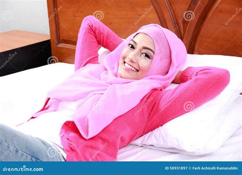 Young Woman Wearing Hijab Lying On Bed Stock Image Image Of Bedroom Behavior 50931897