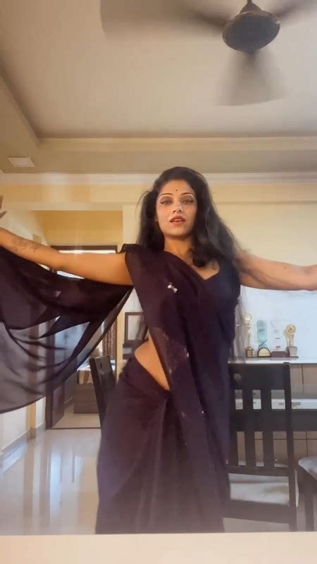 Avantika Mohan Sexy Navel And Hip In Black Saree