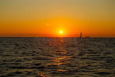 Sunrise Sky Sailing Yacht And Ship On Horizon Stock Image Image Of