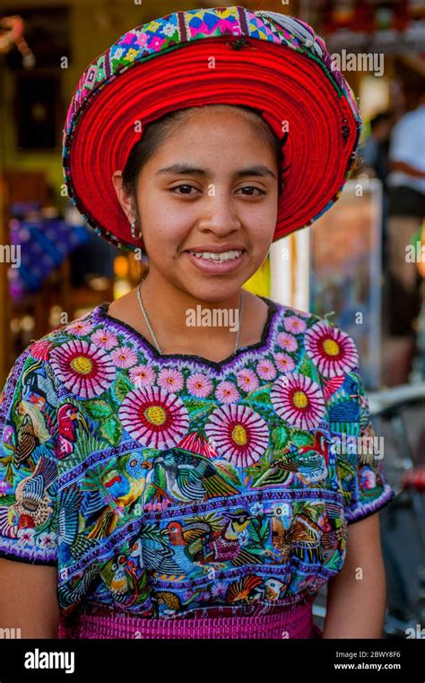 portrait of a teenage mayan girl in traditional dress in the town of panajachel on lake atitlan