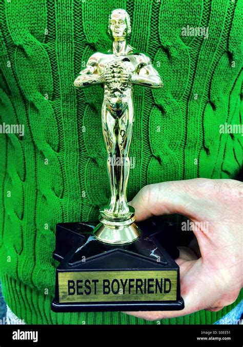 Man Holds His Best Boyfriend Trophy Stock Photo Alamy