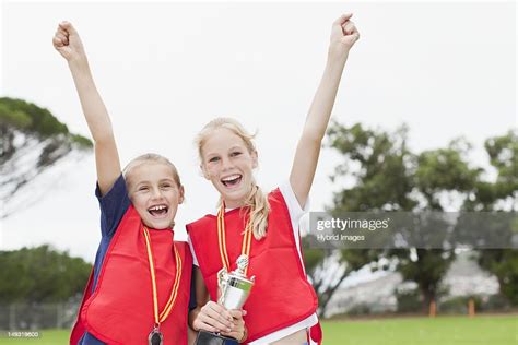 Children Cheering With Medal High Res Stock Photo Getty Images