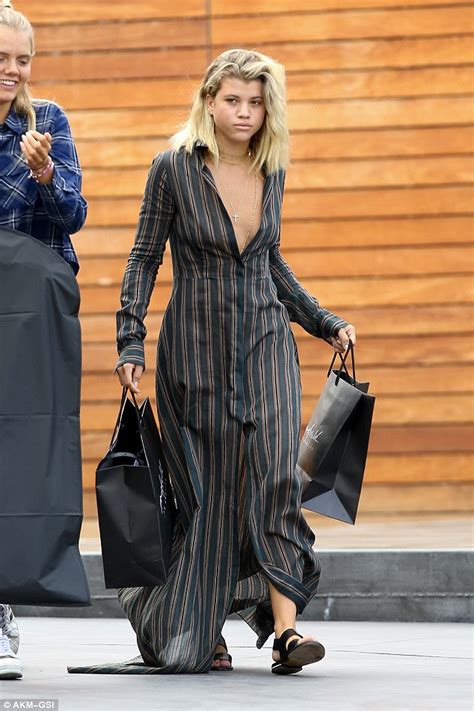 Sofia Richie Suffers A Nip Slip In Plunging Striped Dress Following