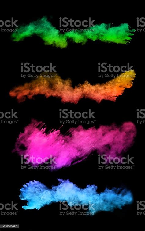 Explosion Of Colored Powders On Black Background Stock Photo Download