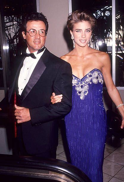 Actor Sylvester Stallone And Girlfriend Jennifer Flavin Attend The