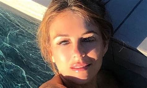 Elizabeth Hurley 54 Sets Pulses Racing As She Goes Topless For A Sultry Swimming Pool Snap In