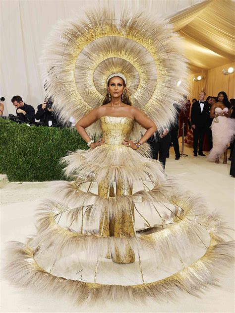 Iman Wears Massive Gold Feathered Headpiece At 2021 Met Gala
