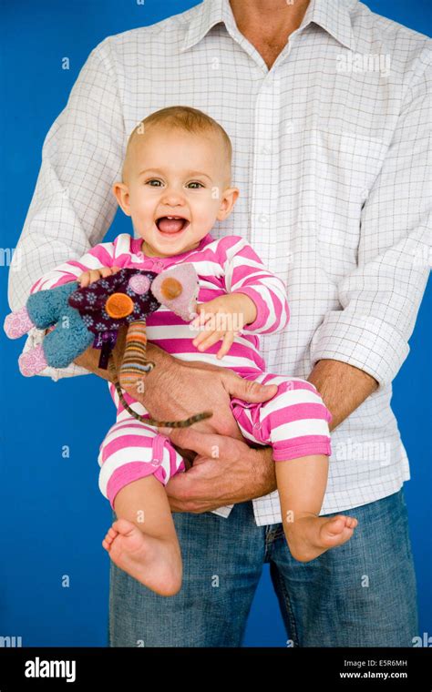 12 Month Old Baby With Father Stock Photo Alamy