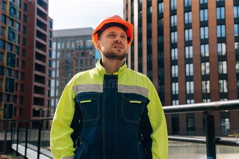Portrait Of A Young Builder In Special Clothes Male Engineer Thinking
