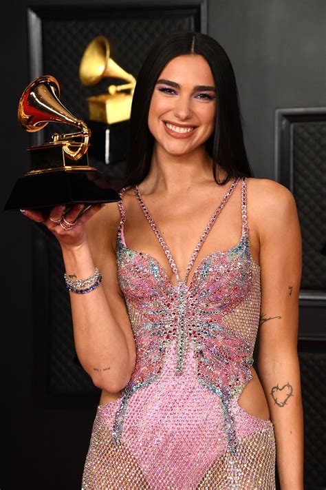 Dua Lipa Stunned In Sexy Pink And Sparkles Outfits During Her Grammys