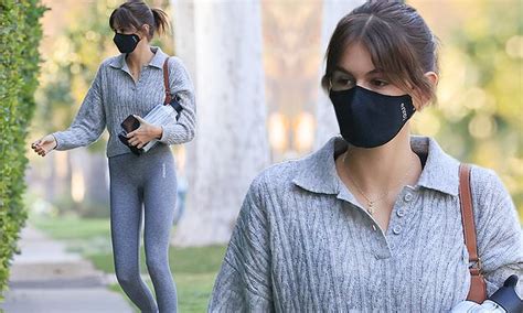 Kaia Gerber Flashes Her Toned Physique In Grey Leggings And A Sweater