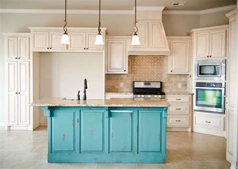 Ux design house design interior design design ideas design model western style rustic style country style turquoise cabinets more information. Distressed turquoise island with cream, glazed cabinets, stone mosaic backsplash | Turquoise ...