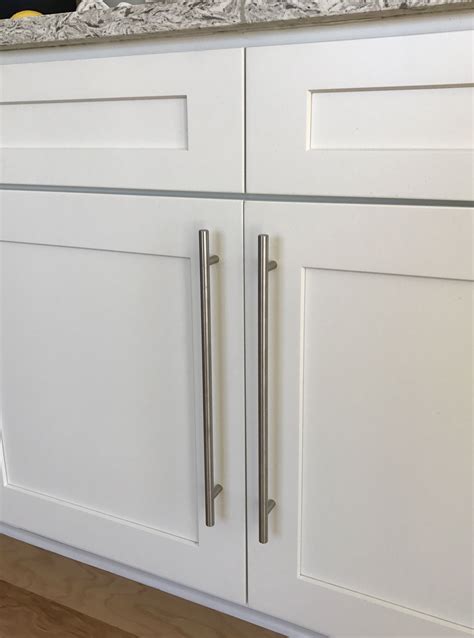 White Shaker Style Cabinets With Stainless Steel European Bar Pulls