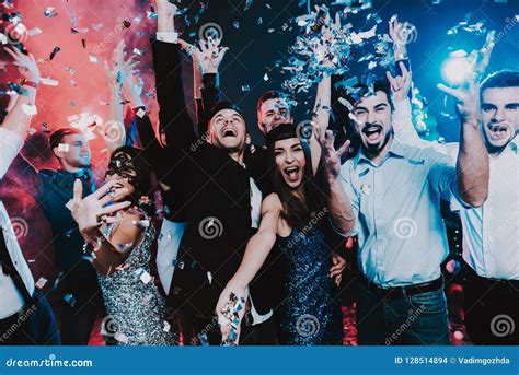 Smiling People Celebrating New Year On Party Stock Photo Image Of