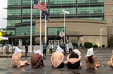 naked protesters protest spit 6th