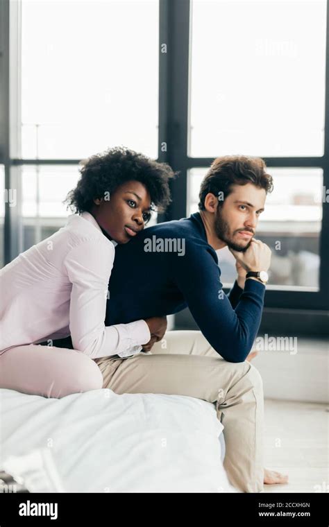 Young Beautiful Interracial Couple In Bed Stressed With Infidelity Problems Confused Afrocan