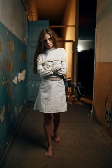 Female Patient In Straitjacket Mental Hospital Stock Photography