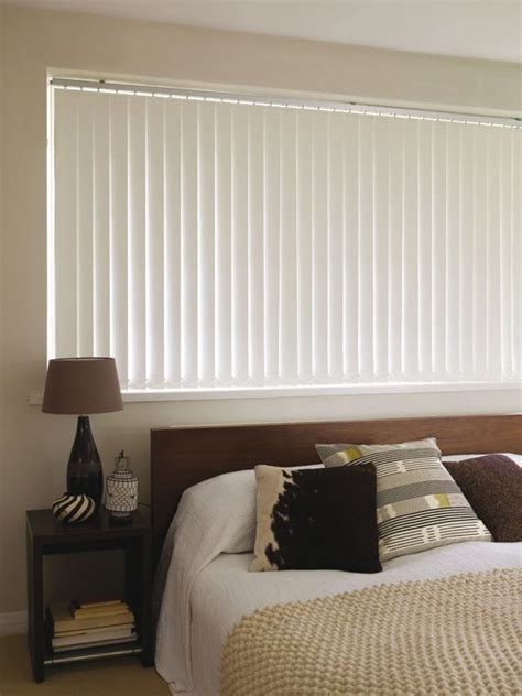 Shop blinds & drapes in various colors, patterns, & textures. White Blackout Vertical Blinds #FabricBlinds | Living room ...