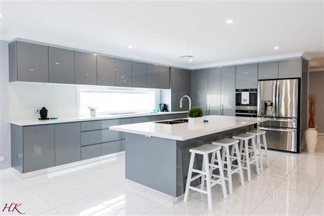 Sarah's grey and white kitchen has a beautiful traditional feel with hints of rustic charm. grey-modern-kitchen-island - Harrington Kitchens