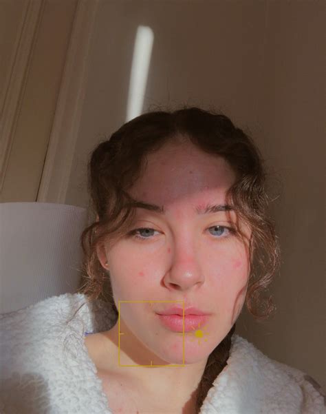 morning golden hour sun sunbeam no makeup braids blue eyes curly hair natural bare face happy