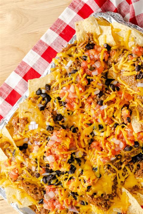 Loaded Pulled Pork Nachos - Mama Needs Cake®