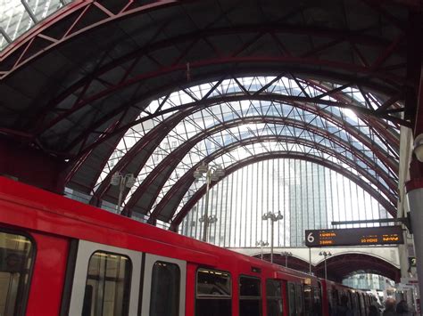 I remember last time we wandered around underground for 15 minutes to find the dlr, and yes, we the bank monument station complex is huge, and even if you know it well, can involve long walks. Canary Wharf DLR Station - our DLR train heading on it's w ...