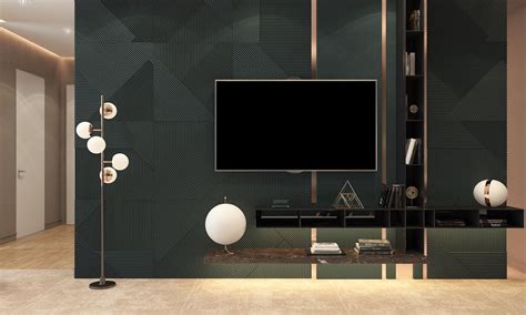 A Modern Living Room With A Large Screen Tv On The Wall And Two Floor Lamps In Front Of It