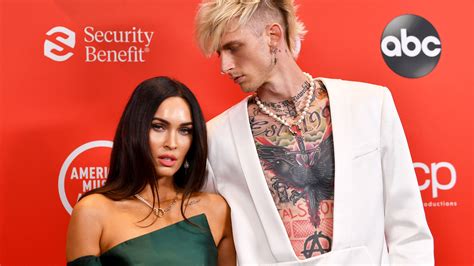 The combination of mgk's galaxy suit and megan's classic little black dress rivaled the stars during. Megan Fox & Machine Gun Kelly Make Red Carpet Debut At 2020 American Music Awards