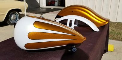 I think the deux chevaux looks best with 2 tone. Examples of our motorcycle paint jobs