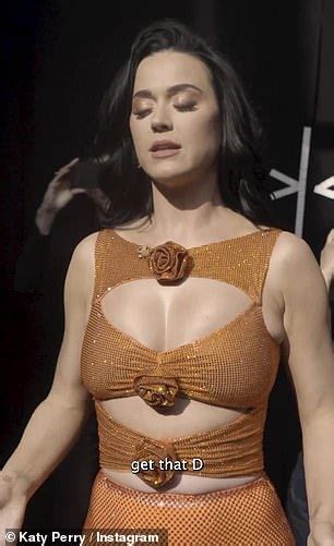 Katy Perry Stuns As She Shows Skin In Sexy Sheer Orange Number With