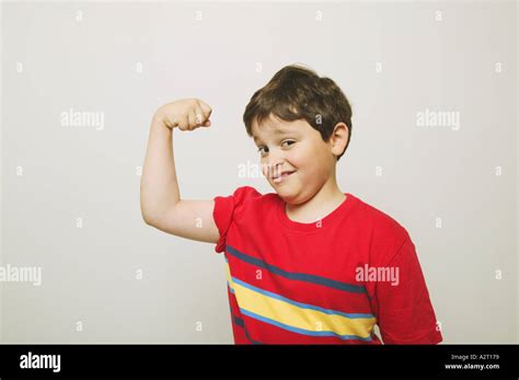 Kids Flexing Muscle Hi Res Stock Photography And Images Alamy