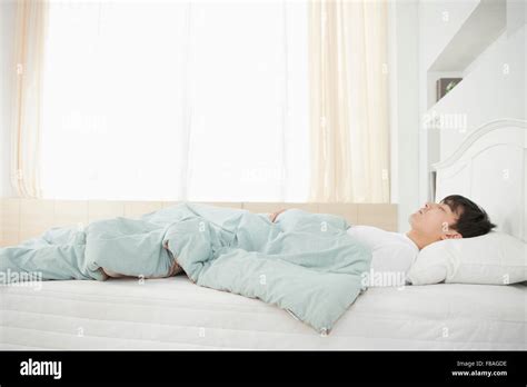 Asian Man Sleeping Hi Res Stock Photography And Images Alamy