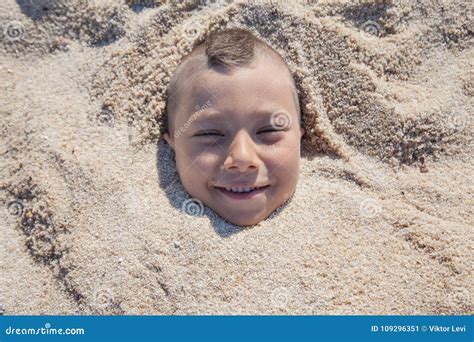 Child Face Buried Sand Stock Image Image Of Face Smiling 109296351