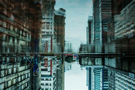 Reflection Of Buildings Photography · Free Stock Photo