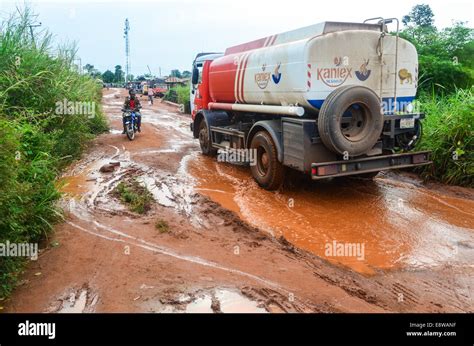A Truck Crossing A Flooded Road During The Rainy Season In Nigeria