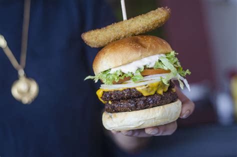 You Need To Try This Vegan Dill Pickle Burger From Atmosphere