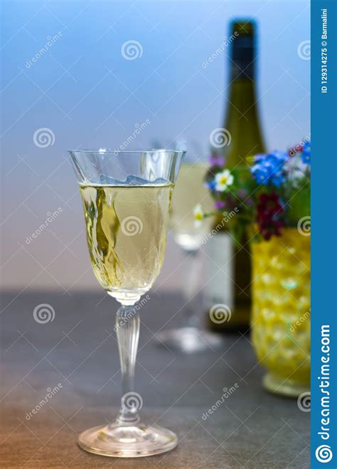 Two Glasses Of White Wine Served On Table With One Bottle Stock Image Image Of Concept White