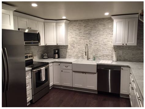 White kitchen appliances also blend in nicely when other soft or bright colors are involved. Cabinets Best Matched with Dark Appliances | Premium Cabinets