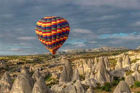 Colorful Hot Air Balloon Flying Over The Goreme Valley Stock Image