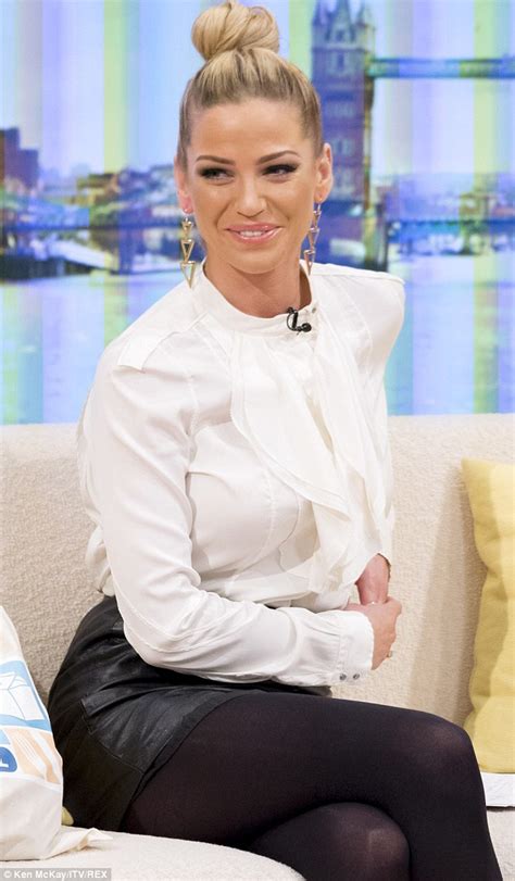 sarah harding slips into uncharacteristically prim high necked shirt and pencil skirt for tv