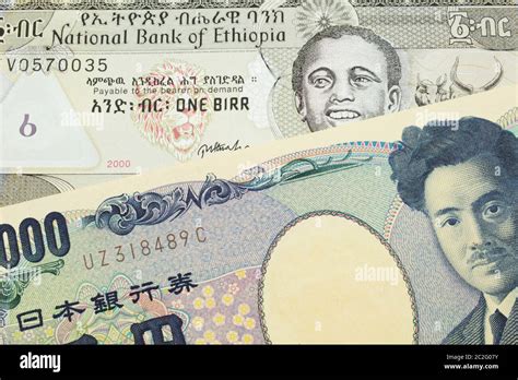 Una Imagen Macro De Un Billete Japonés De Mil Yenes Se Combinó Con Un Billete Gris Etíope De Un
