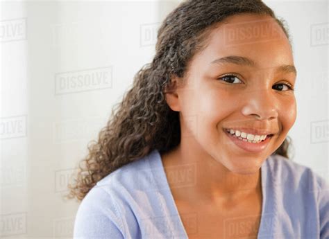 Smiling Mixed Race Girl Stock Photo Dissolve