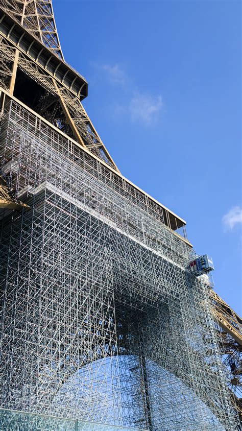 Outstanding Scaffolding Seen On The Forecourt Of The Eiffel Tower As