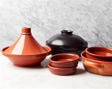 Unglazed Clay Cooking Pots With Spoon And Hot Pot N