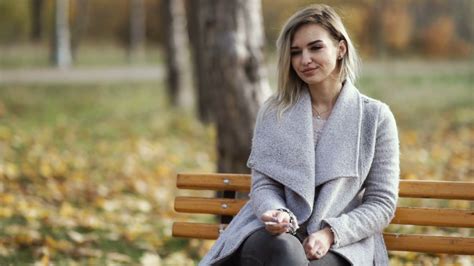 Young Beautiful Business Woman Smoking A Cigarette In The Park Autumn