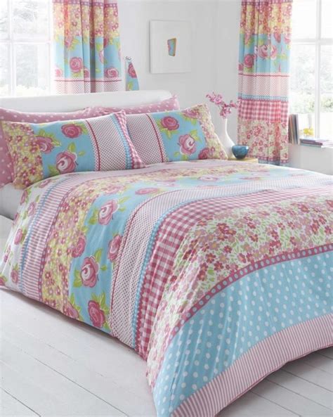 A cozy french country and shabby chic bedorom with a crystal pendant lamp, chic furniture, pastel bedding and lots of blooms. Shabby chic curtains -elegance and romantic atmosphere in ...