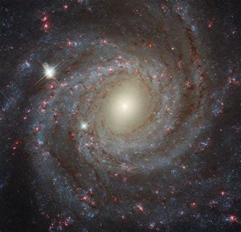 Las letras minúsculas tienen la misma interpretación que las galaxias espirales. NGC 3344, uma galáxia espiral levemente barrada. Barra é ...