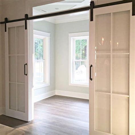 The Beauty And Functionality Of Glass Sliding Barn Doors Glass Door Ideas